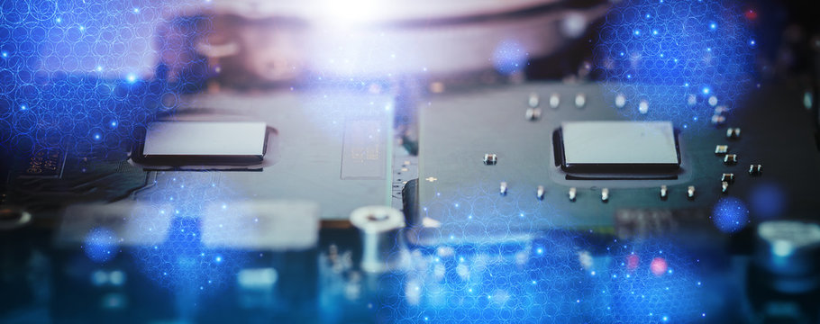 Computer Technology: Close up of a computer chip on a circuit board. Light effect.