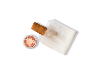 Top View of Crispy Spring Roll in White Paper Bag and Sweet Sauce for Delivery (Takeaway) on White Background. Asian Food. Delivery Food. Clipping Path on the Main Object (not the shadow) Included.