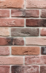 The background of the wall is a red brick surface. Abstract wall background.