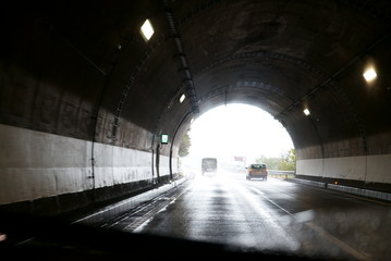 Naklejka na ściany i meble Blurred image running on highway on rainy day