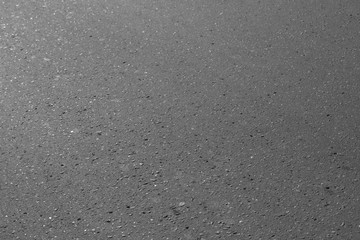 Asphalt background texture. New fresh asphalt black and white.