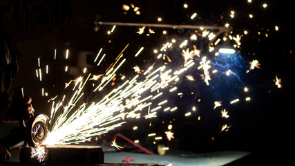 Metal processing using an abrasive wheel.