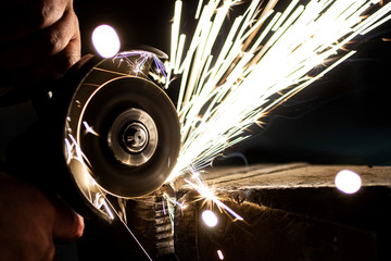Metal processing using an abrasive wheel.