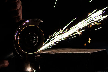 Metal processing using an abrasive wheel.