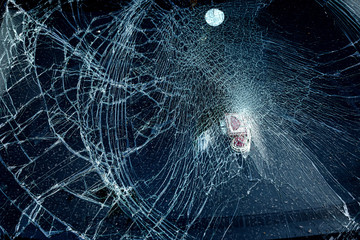 Cracked glass from car crash accidental with selective focusing