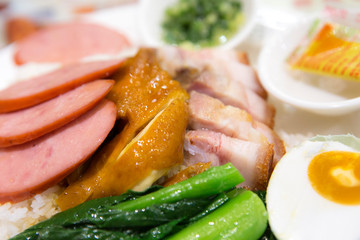 roasted duck and crispy pork ham and boiled egg