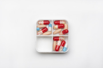 tablets and capsules in a box, pharmaceutical medicine, concept medicine.