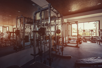 interior of new modern gym with equipment.