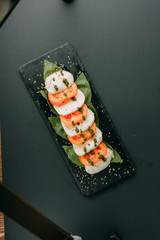 Stuffed tomatoes with cheese and basil