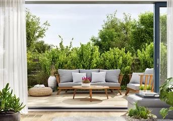 Fotobehang Cozy patio area with garden furniture, sliding doors and decking © slavun