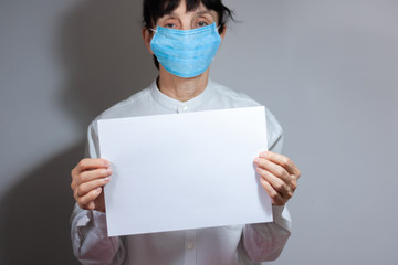 Coronavirus quarantine and Air pollution pm2.5 concept. Old sick woman wearing respirator mask for protect. Wuhan, China epidemic virus symptoms background, copy space.