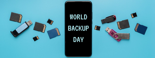 Conceptual World Backup Day background,text:"World Backup Day",data base safety, storage device