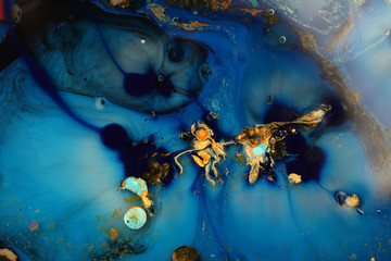 Macro Abstract blue color marble texture background. Acrylic color in water and oil.