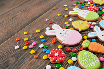 Easter ginger cookies isolated on wooden table.