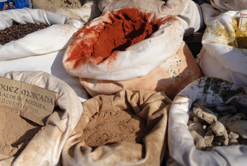 Colorful spices powders and herbs in traditional street market. 