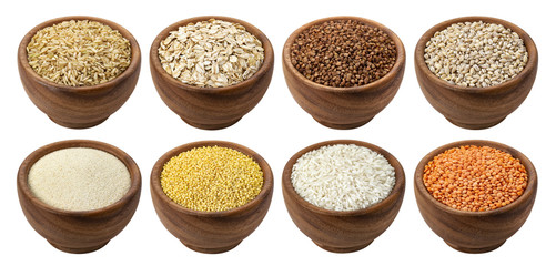 Buckwheat, millet, rice and semolina isolated on white background