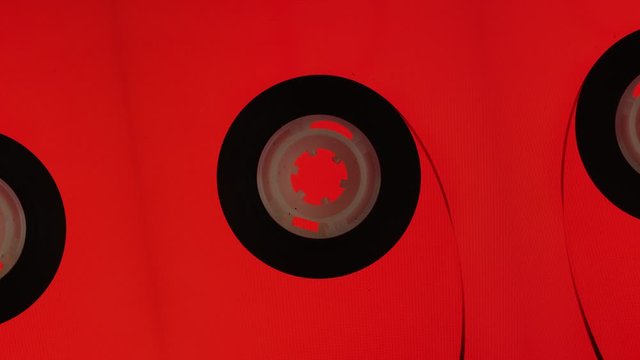 Cassette reel retro style old school style on RGB abstract background. Retro music concept. 1980s