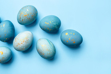 Easter frame of eggs painted in blue color.