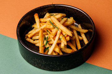 plate with french fries on color background. menu concept