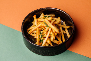 plate with french fries on color background. menu concept