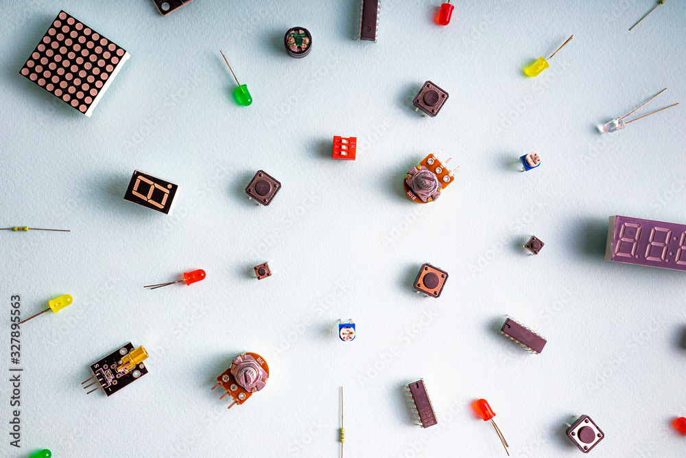 Wall mural micro electronics arduino diy components on a light background, top view