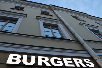 burgers symbol on building wall