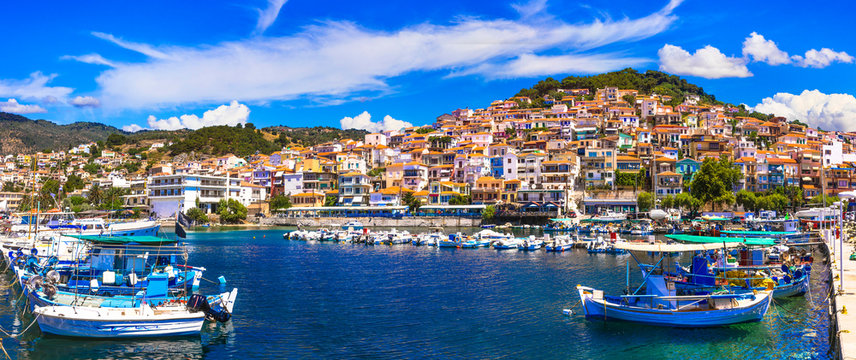 Greece Lesvos 12K Panorama of Plomari Town with Colorful Houses on Hill and Traditional Fishing Boats in Harbor Scenic Aegean Island Architecture Travel