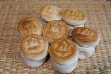 Prosphora, Prosper, is the church bread used for communion in the Orthodox Church. Whole and sliced.