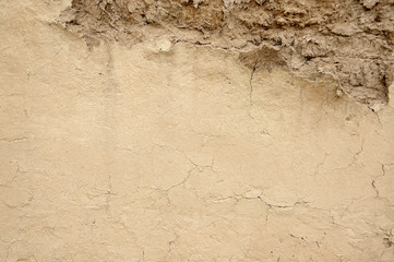texture of crumbly and crooked clay wall