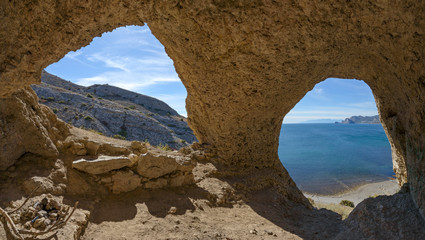 Scenic view inside mountain grotto Aeolian Harp, Sudak, Crimea, Russia.