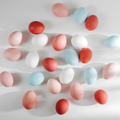 Natural Colored Eggs with sunlights. Compositions in pastel colors. Easter consept.  Flat lay, top view