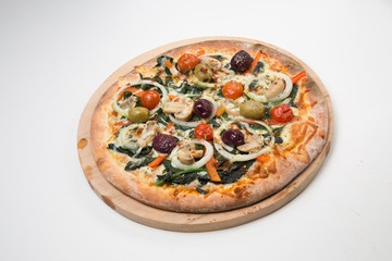 Vegetarian pizza or pizza with onions, mixed olives, mushrooms  and tomato with a white background