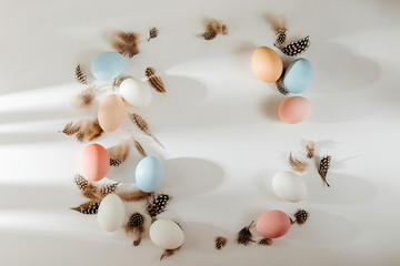 Natural Colored brown, quail and white Eggs with sunlights. Compositions in pastel colors. Easter consept.  Flat lay, top view . © igishevamaria
