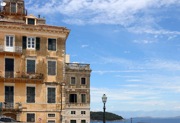 Fototapeta na wymiar Old buildings sea and blue sky Corfu Greece