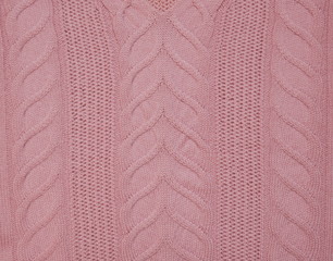 Knitted braids pink sweater design material canvas texture background.