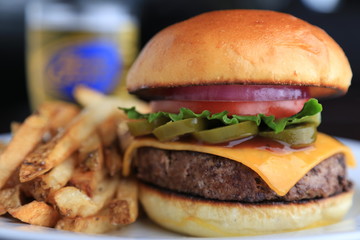 Jalapeno Cheese burger fries and a beer