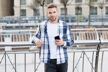 Urban wifi. Smartphone settings. Sharing location options. Application. Man hold smartphone...