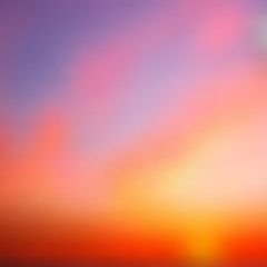Beautiful summer sunset, violet and pale violet-red stripes at the top, and the transition from yellow and orange to titanium, blur, sky, sun, gradient.