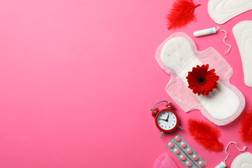 Obraz na płótnie Canvas Menstrual period concept on pink background, top view