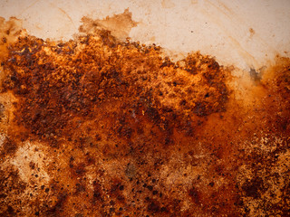 Brown and yellow rust on white enamel. Rusted brown and white abstract texture. Corroded white...