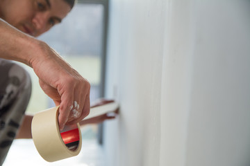Preparing for painting wall. Close Up