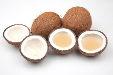 Coconut with milk cut on a white background. vitamin fruits. healthy food