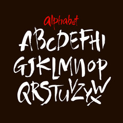 Obraz premium Vector Acrylic Brush Style Hand Drawn Alphabet Font. Calligraphy alphabet on a black background