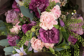 variety of colors near the Liberty store in London. Large bouquets in tin vases.