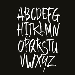 Fototapeta na wymiar Vector Acrylic Brush Style Hand Drawn Alphabet Font. Calligraphy alphabet on a black background. Ink hand lettering.