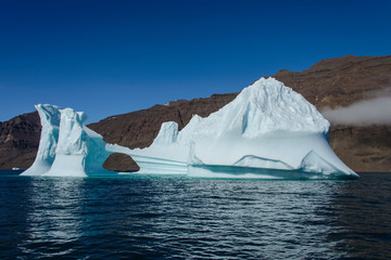 Beautiful landscape with iceberg in Greenland at summer time. Sunny weather.
