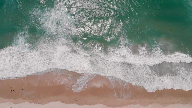 Aerial shot of a beautiful surf beach in the Coromandel, New Zealand