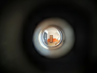 View to the hall through peephole eyelet in the door. Slovakia
