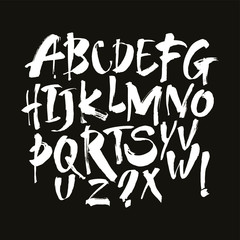 Vector Acrylic Brush Style Hand Drawn Alphabet Font. Calligraphy alphabet on a black background. Ink hand lettering.