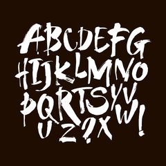 Vector Acrylic Brush Style Hand Drawn Alphabet Font. Calligraphy alphabet on a black background